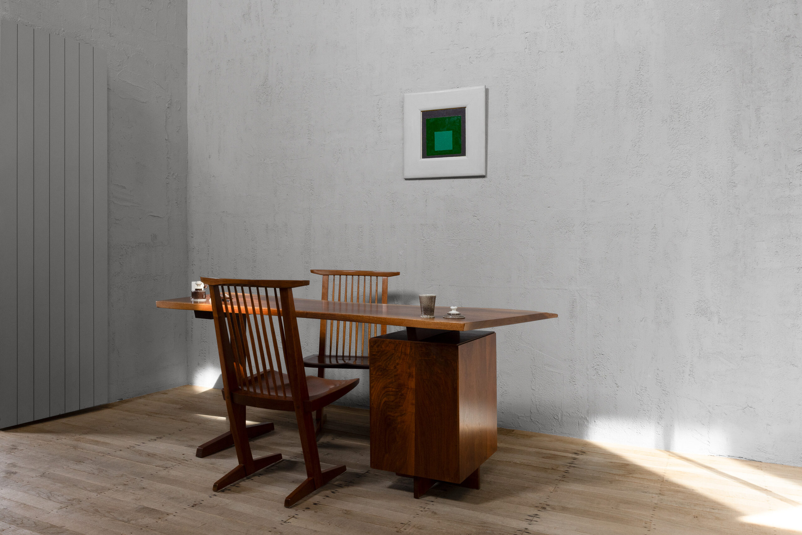 Installation view: George Nakashima, Single Pedestal Desk, c. 1970, American Black Walnut, h 74 × l 195 × d 79 cm; Josef Albers, Homage to the Square, 1954, Oil on Masonite, 52 x 52 cm; and deskware by Steve Harrison