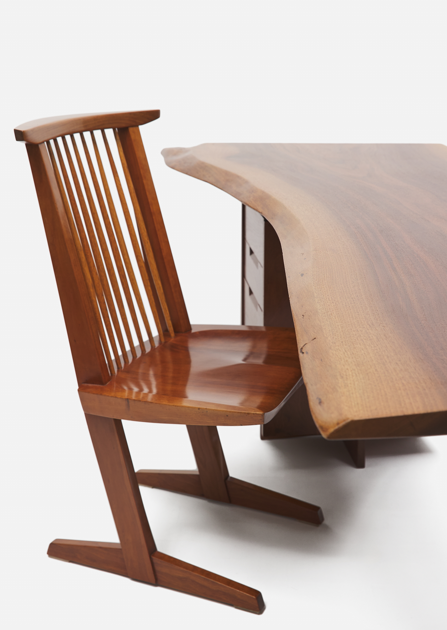 Installation view: George Nakashima, Single Pedestal Desk, c. 1970, American Black Walnut, h 74 × l 195 × d 79 cm; George Nakashima, Conoid Chair, c. 1970,
Set of two, American Black Walnut, h 90 (seat h 43) × w 50 × d 50 cm